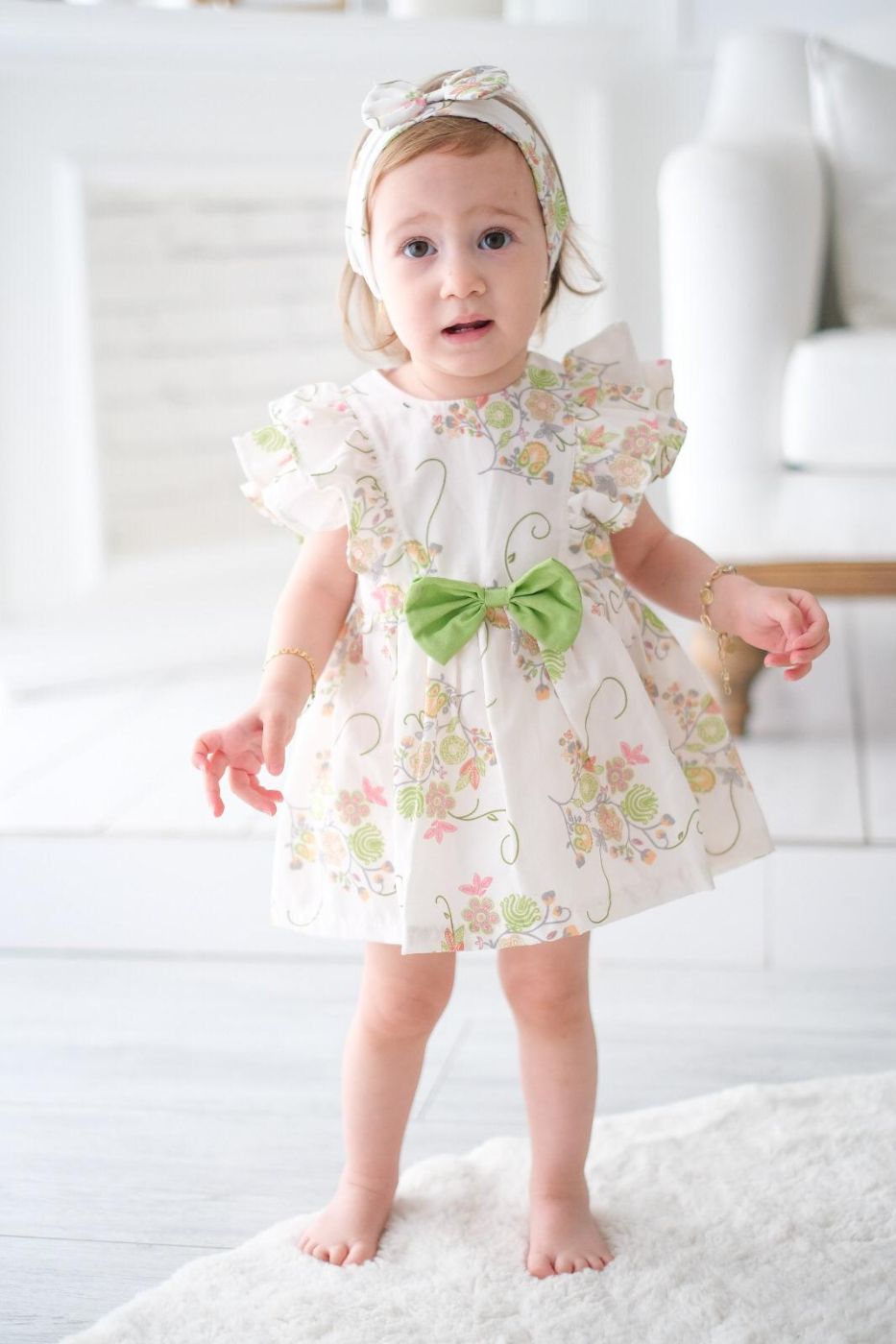 Cvetna bodi haljina sa zelenom mašnom